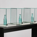 Form Department PODIUM.Z9 – Haubenvitrinen-Trilogie mit Portal-Unterbau