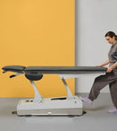 Table de massage électrique Soleni Swop 2W PRO pour cabinets médicaux et spas, avec accoudoirs pliables