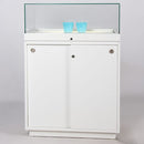 Form Department PODIUM.X32 – Hohe Sockelvitrine mit Leuchtboden und Klapp-Öffnung