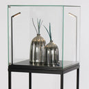 Form Department  PODIUM.M3 – Haubenvitrine mit Drehtür auf Metallgestell